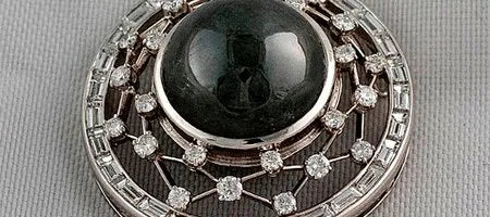 This Cabochon-Cut Black Diamond Masquerades as a Tahitian Pearl