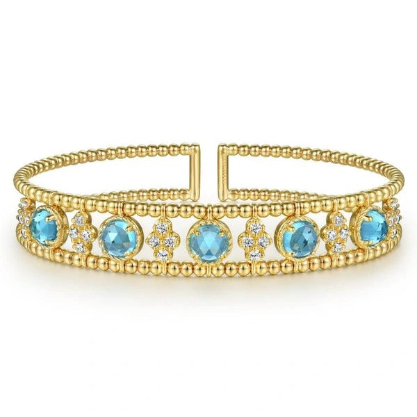 14K Yellow Gold Bujukan Bead Cuff Bracelet with Inner Diamond Cluster and  Blue Topaz Connectors.