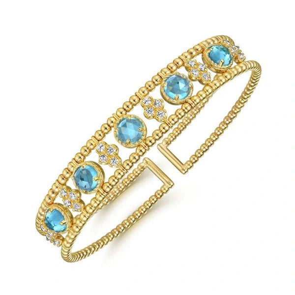 14K Yellow Gold Bujukan Bead Cuff Bracelet with Inner Diamond Cluster and  Blue Topaz Connectors.