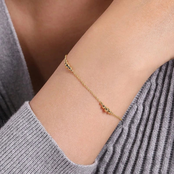 14K Yellow Gold Graduating Bead Stations Bracelet
